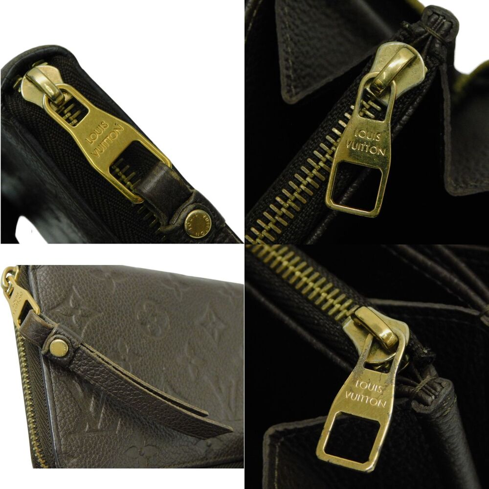 LOUIS VUITTON Zippy Wallet Monogram Implant Calfskin Embossed Tail Brown